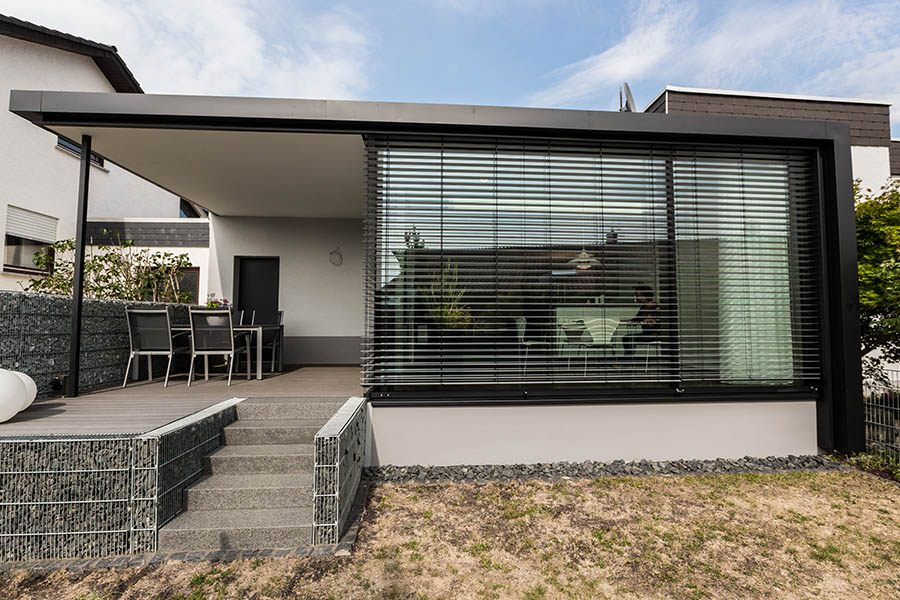 Holz-Aluminium Wintergarten mit Terrassendach